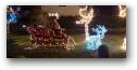 Mikołaj na saniach z zaprzęgiem dwóch reniferów.  » Click to zoom ->